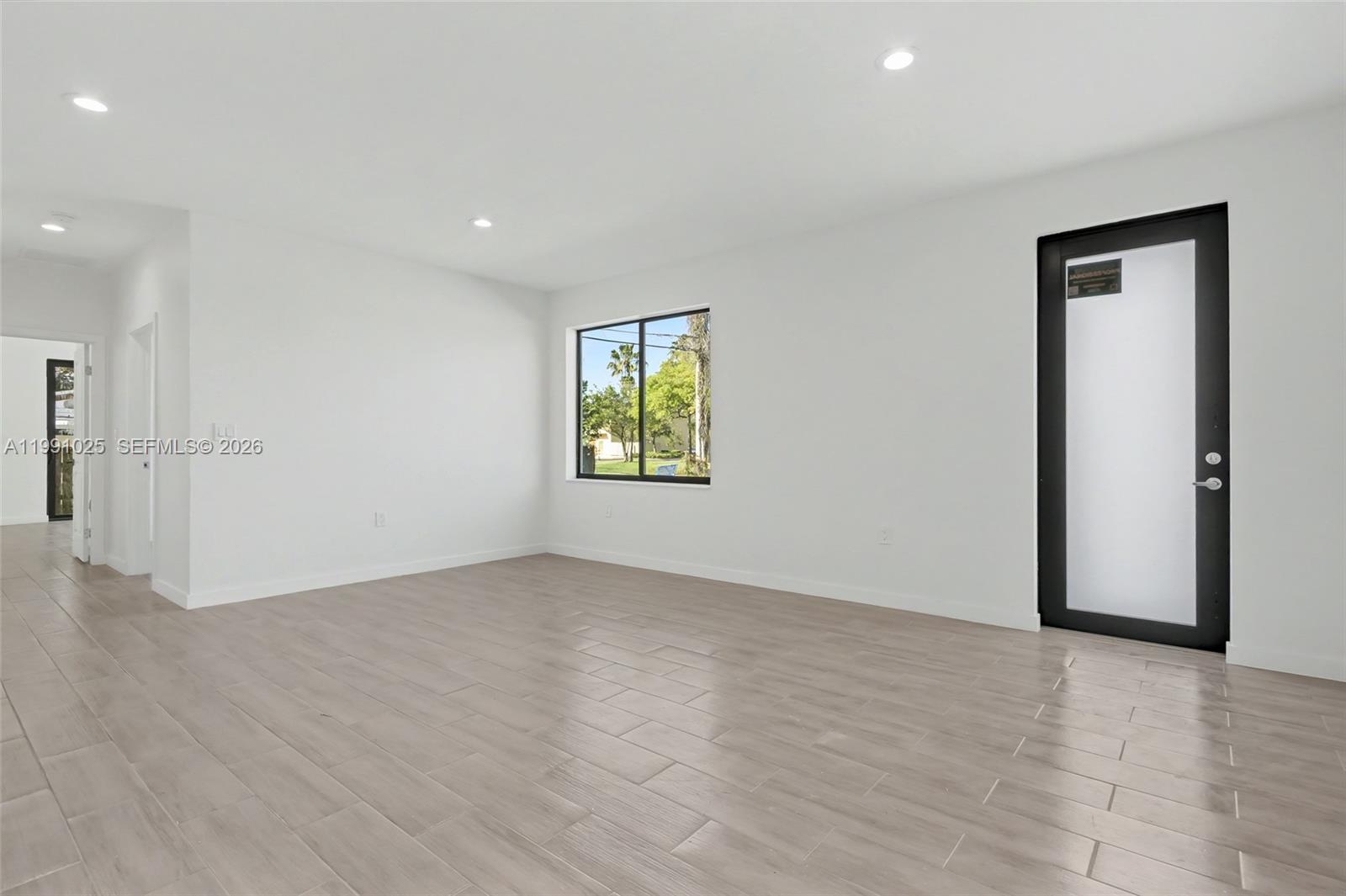 6140 Southwest 39th Street Miramar, FL 33023 - Photo 11 of 40 a view of an empty room with a window