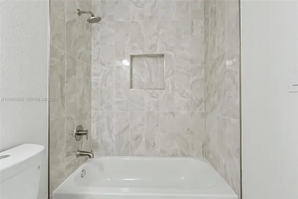 a bathroom with a bathtub