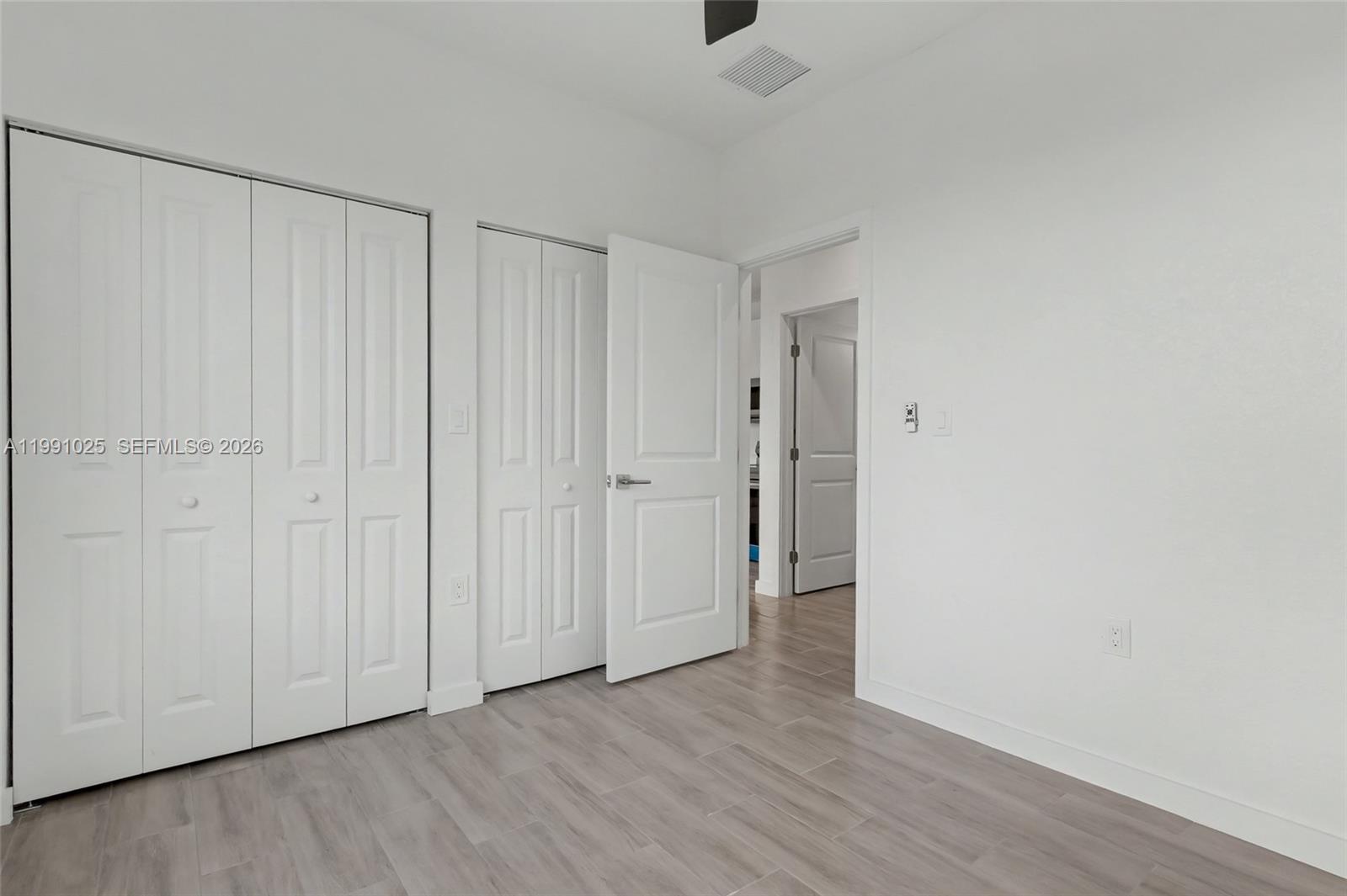 6140 Southwest 39th Street Miramar, FL 33023 - Photo 20 of 40 a view of a room with wooden floor