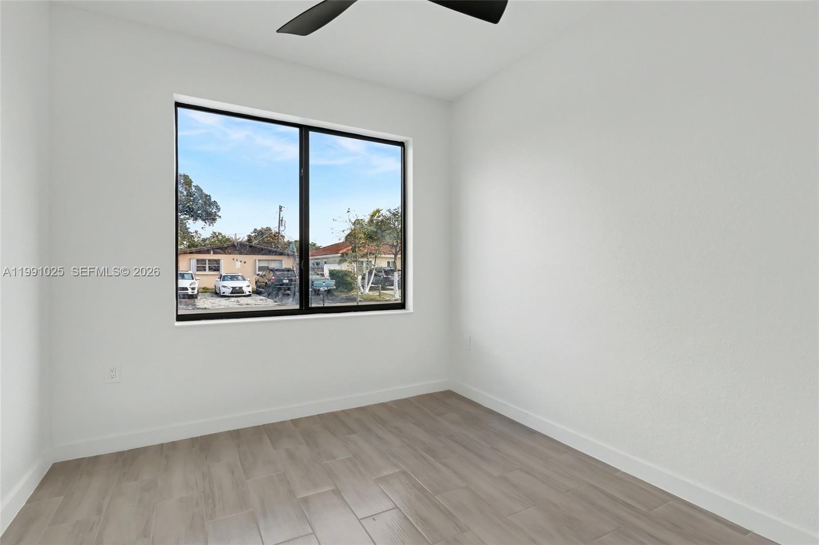 6140 Southwest 39th Street Miramar, FL 33023 - Photo 31 of 40 an empty room with a window