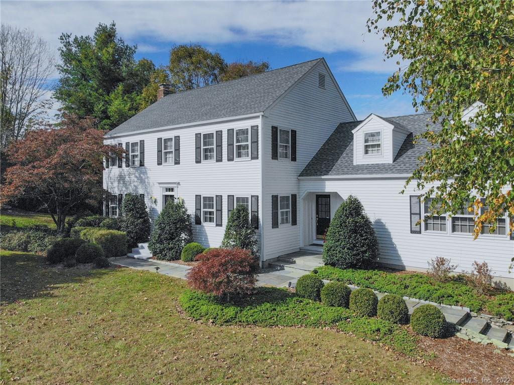 5 Concord Ridge Road Newtown, CT 06470 - Photo 1 of 1 a front view of a house with garden