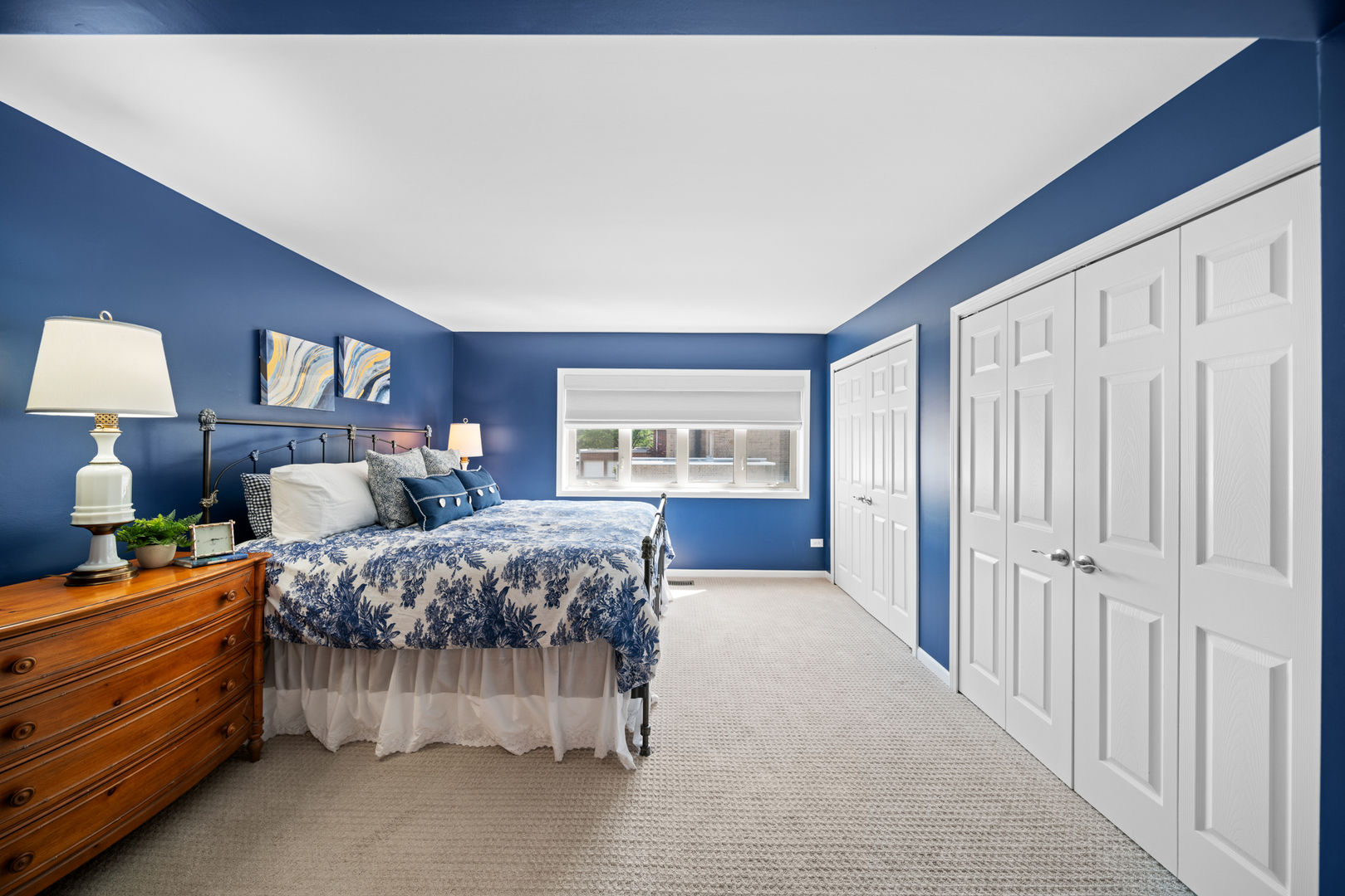 710 Ballantrae Drive, Unit B Northbrook, IL 60062 - Photo 15 of 28 a bedroom with bed and window