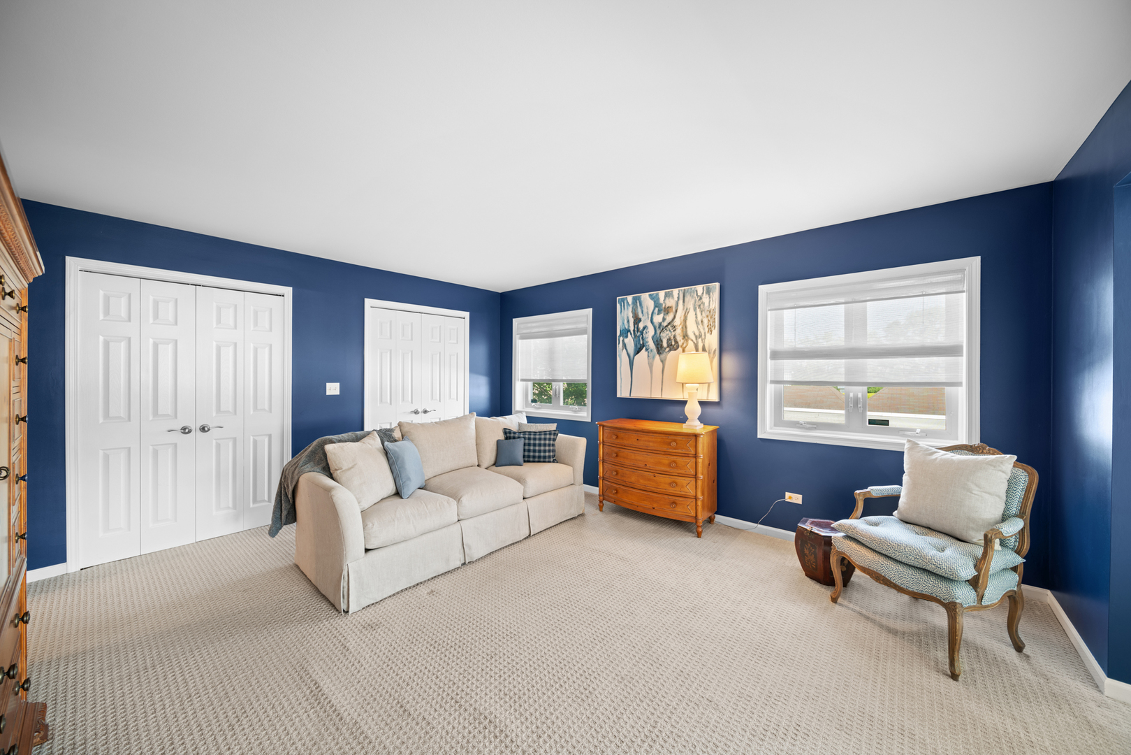 710 Ballantrae Drive, Unit B Northbrook, IL 60062 - Photo 16 of 28 a living room with furniture and a large window