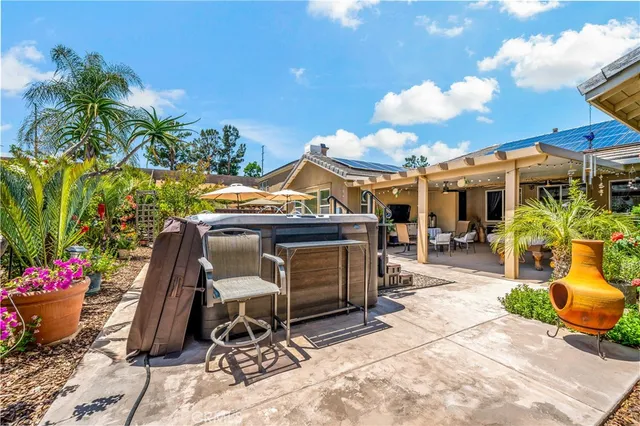 a view of a yard with a patio