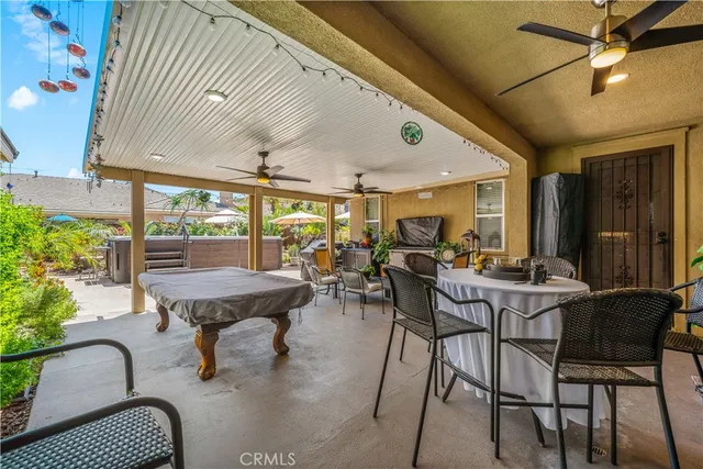 an aerial view of residential houses with outdoor space and river