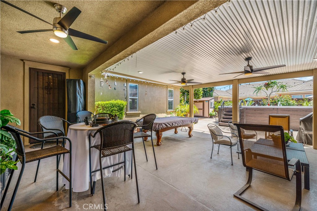 29009 Smooth Sailing Court Menifee, CA 92585 - Photo 48 of 62 a view of a dining room with furniture window and outside view