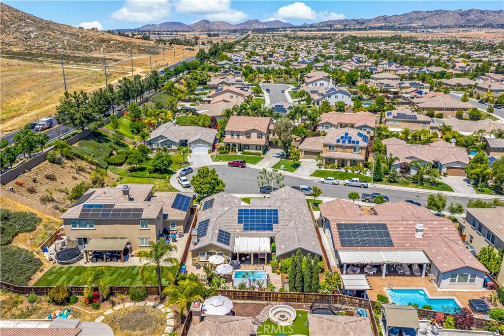 29009 Smooth Sailing Court Menifee, CA 92585 - Photo 9 of 62 an aerial view of residential houses with outdoor space