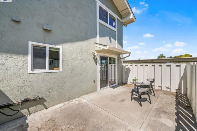 a balcony with furniture