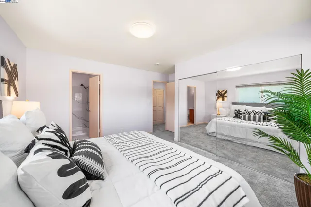 a swimming pool with wooden fence