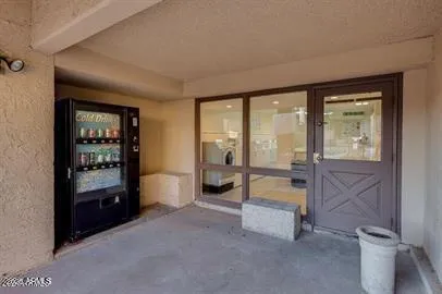 a room with window and furniture