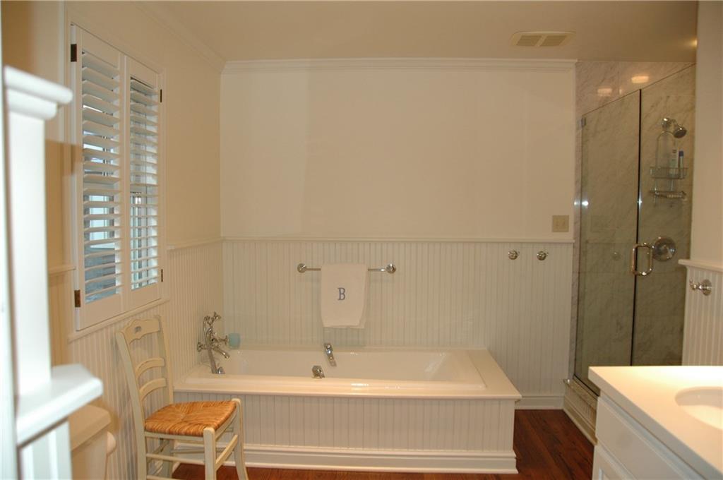 508 Beaver Road Edgeworth, PA 15143 - Photo 15 of 25 Master bath is adjacent to walk-in closet with built-ins. Marble shower, Corian counter, linen closet to left.