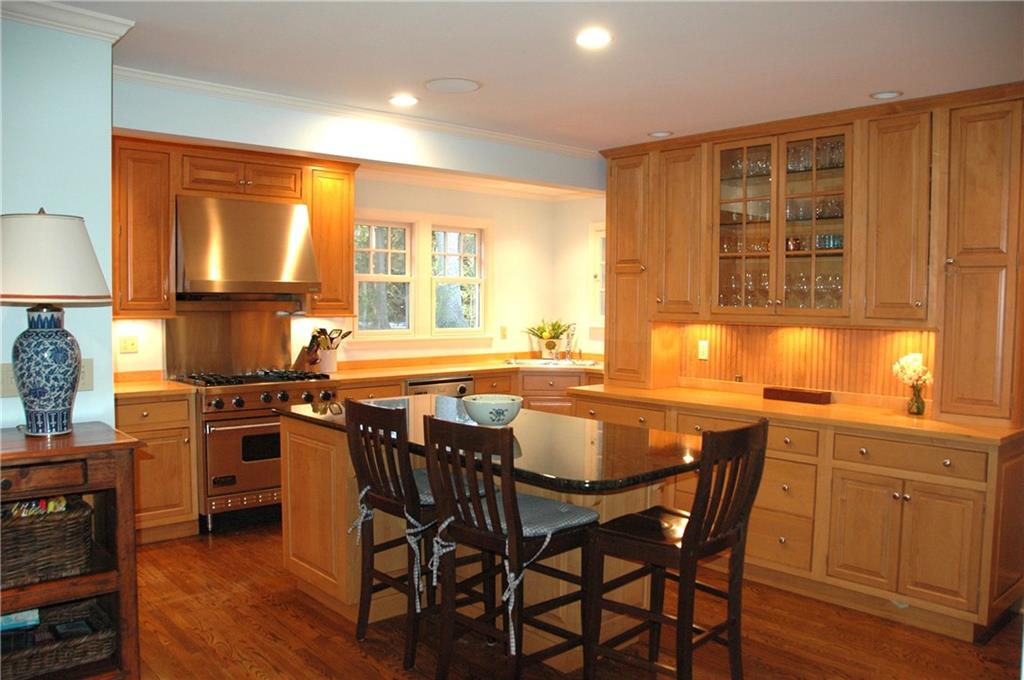 508 Beaver Road Edgeworth, PA 15143 - Photo 6 of 25 Kitchen has maple cabinets, butcher block counters, granite island and stainless appliances.