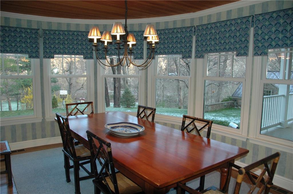 508 Beaver Road Edgeworth, PA 15143 - Photo 9 of 25 Unique Dining Room with bead board ceiling, wall of windows and French door to covered porch.