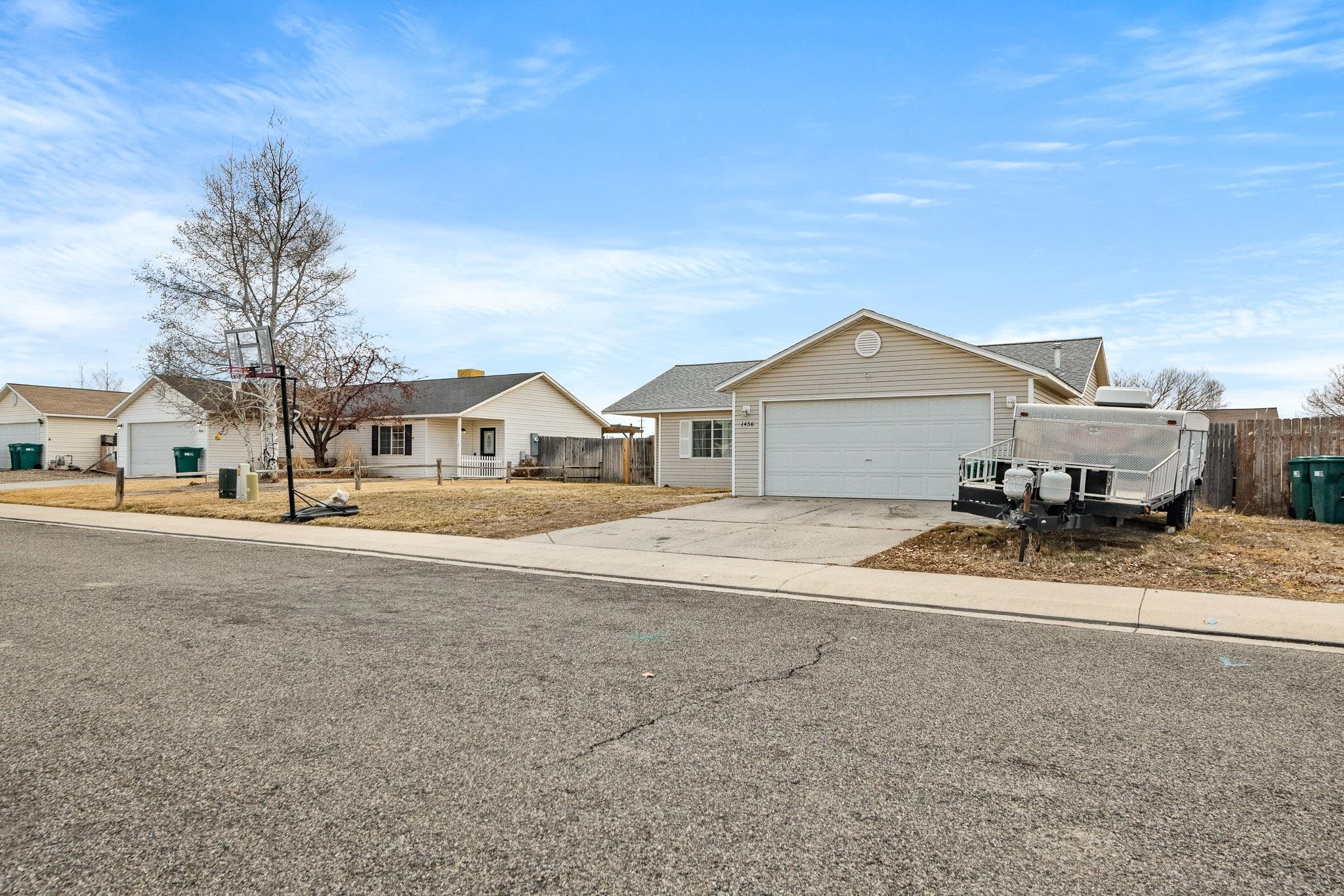 1456 Sagittarius Street Fruita, CO 81521 - Photo 1 of 19 a view of house with a outdoor space