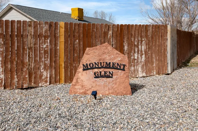 a street view with wooden fence