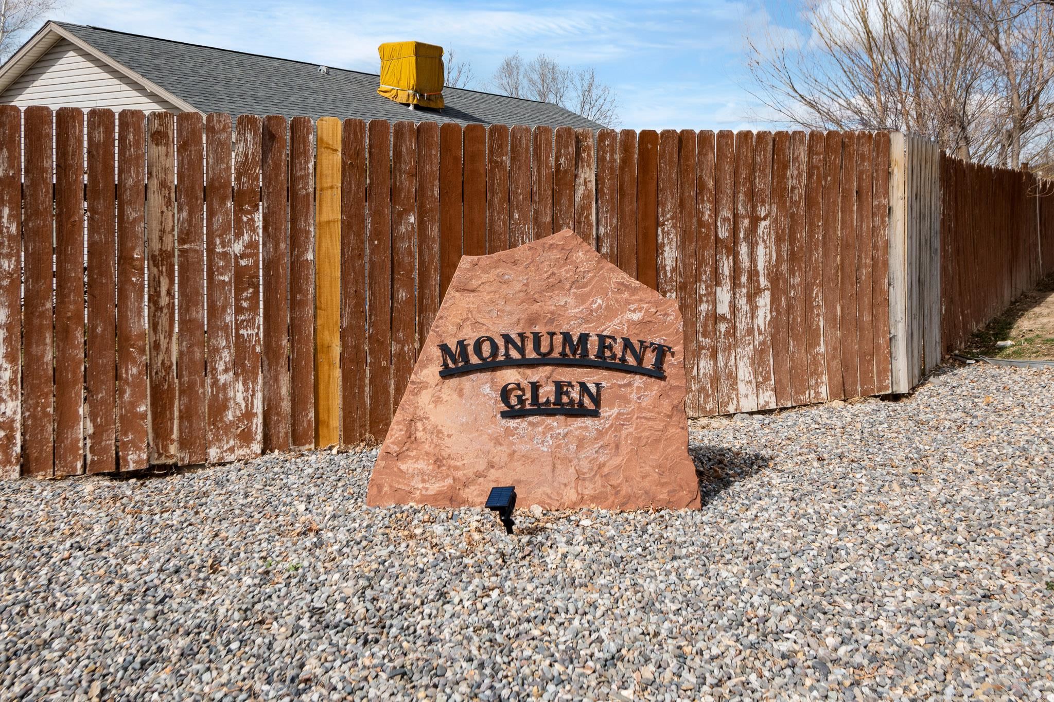 1456 Sagittarius Street Fruita, CO 81521 - Photo 18 of 19 a street view with wooden fence