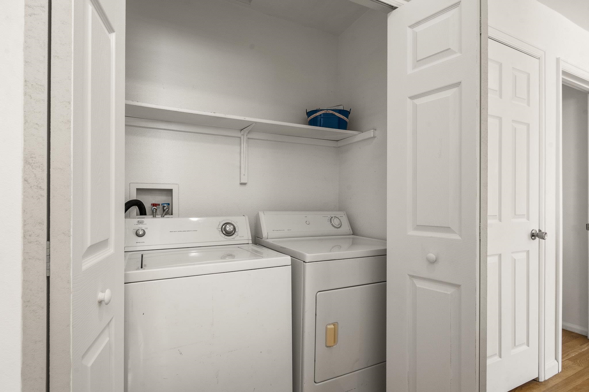 1456 Sagittarius Street Fruita, CO 81521 - Photo 8 of 19 a utility room with dryer and washer