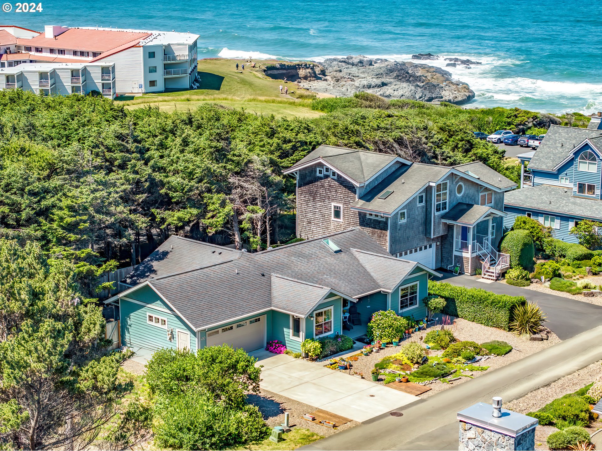 490 Lemwick Lane Yachats, OR 97498 - Photo 1 of 42 an aerial view of a house with a yard