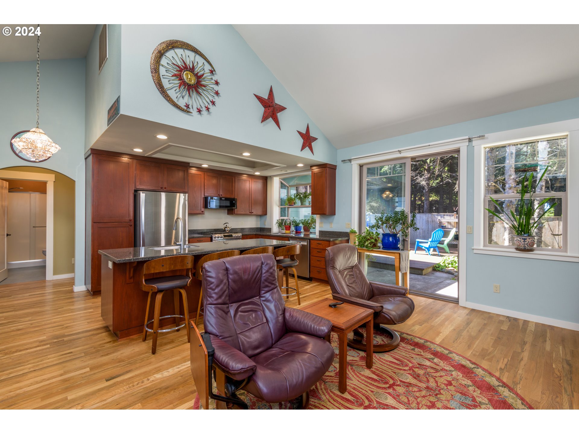 490 Lemwick Lane Yachats, OR 97498 - Photo 12 of 42 a living room with furniture and a large window