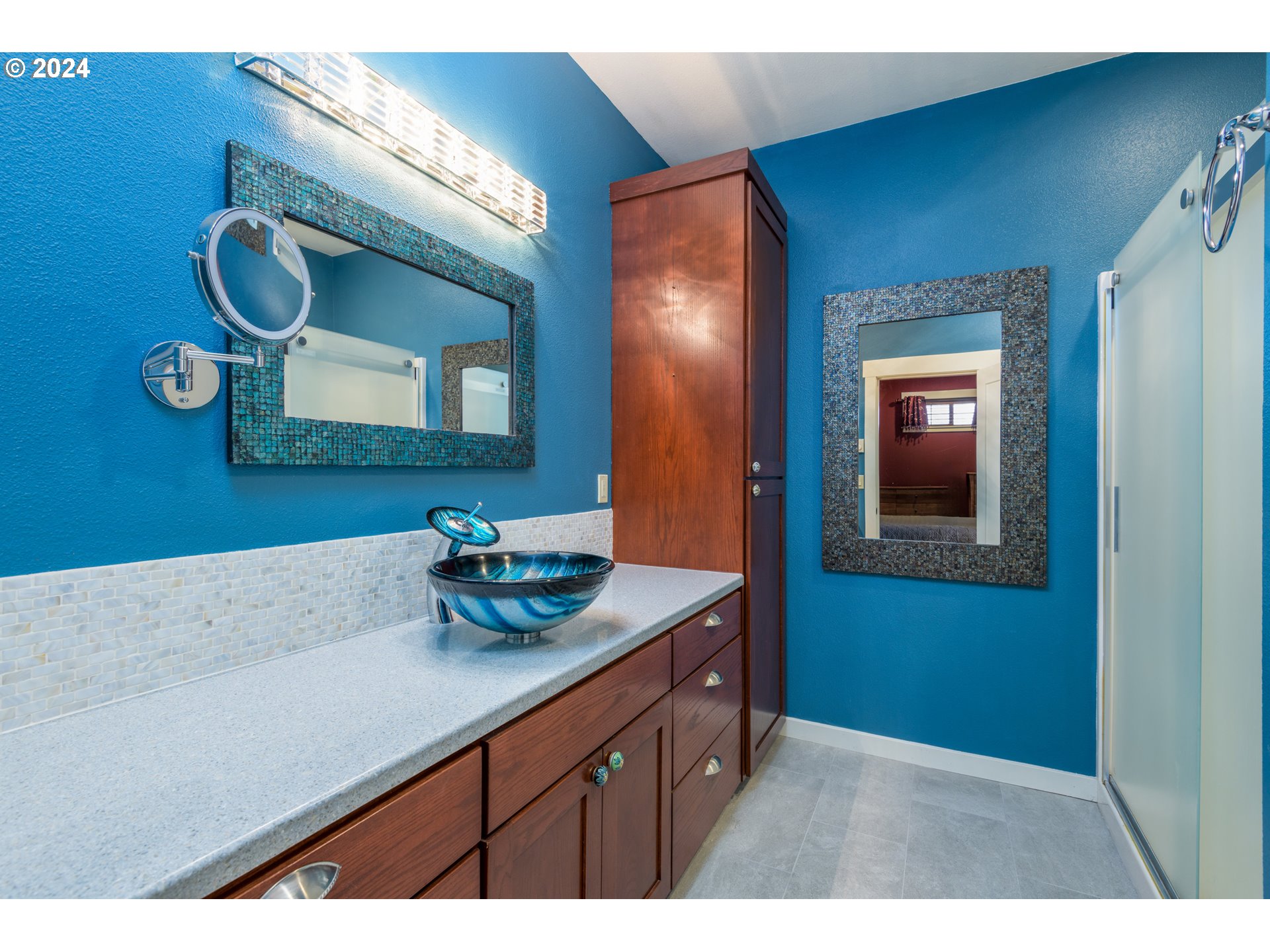 490 Lemwick Lane Yachats, OR 97498 - Photo 26 of 42 a bathroom with a sink and a mirror