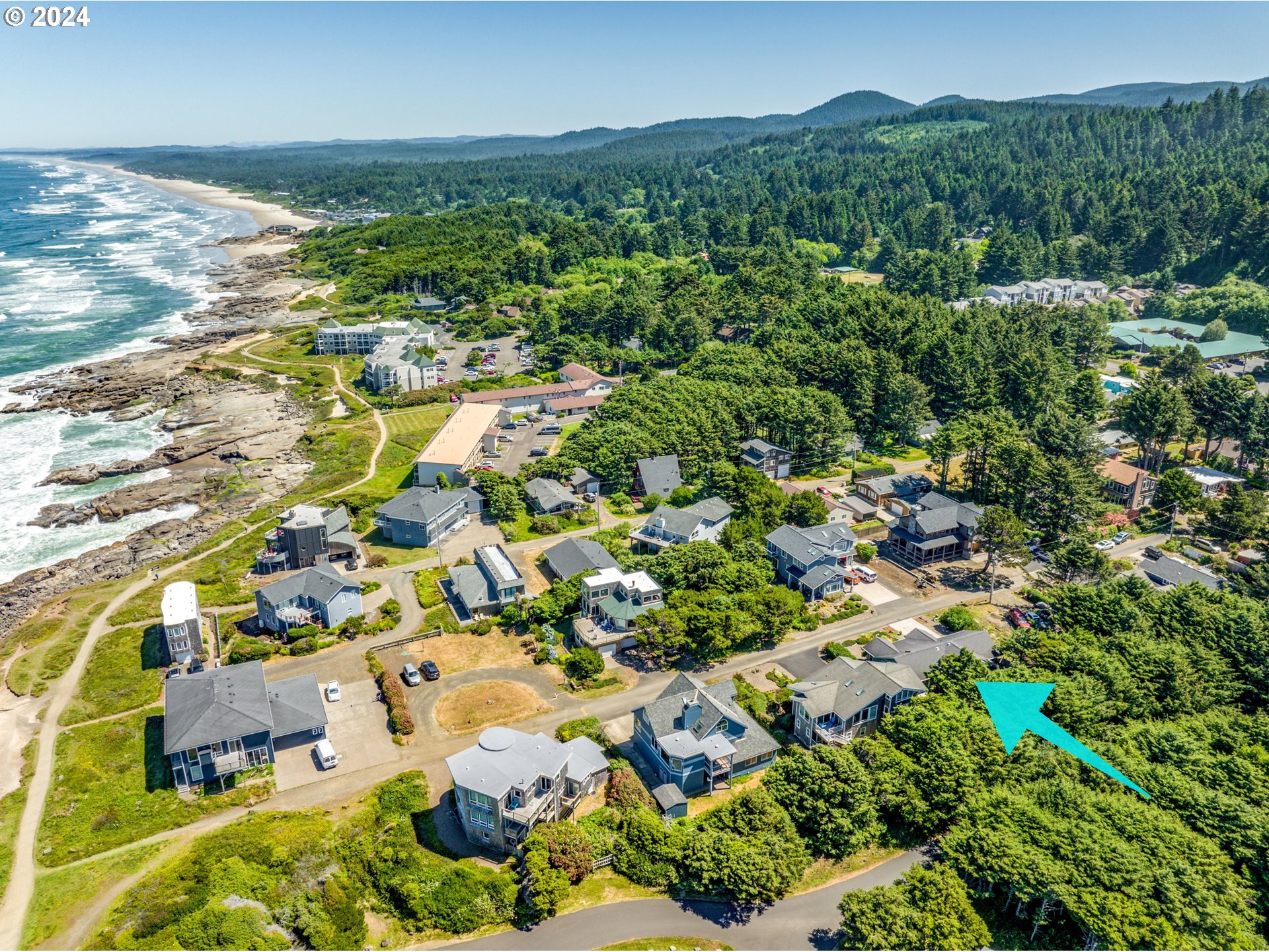 490 Lemwick Lane Yachats, OR 97498 - Photo 40 of 42 an aerial view of residential houses with outdoor space and trees all around