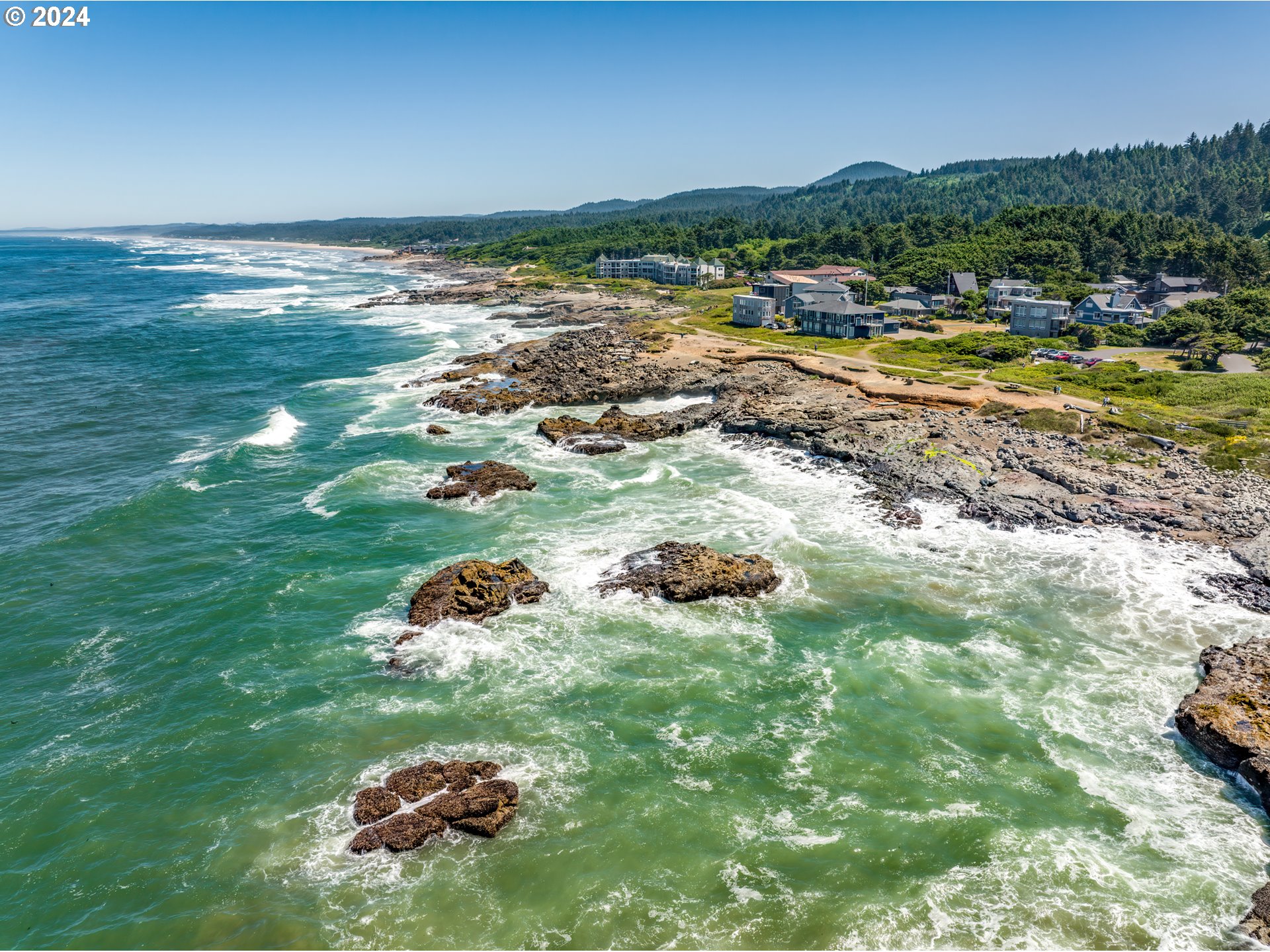 490 Lemwick Lane Yachats, OR 97498 - Photo 42 of 42 a backyard of a house with a yard and outdoor seating