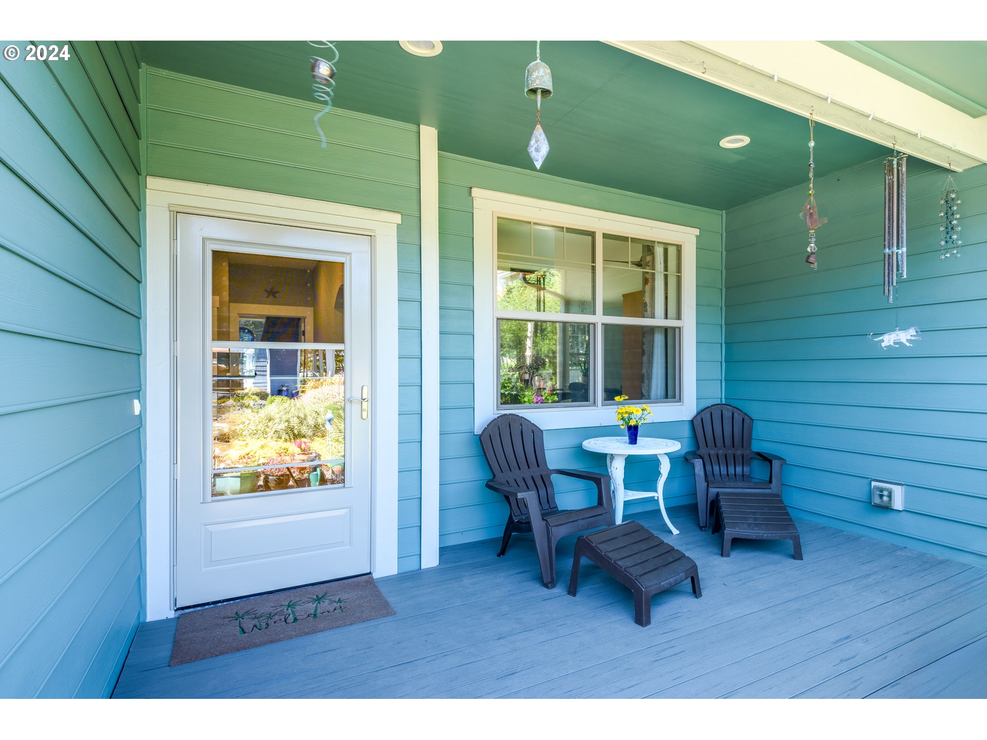 490 Lemwick Lane Yachats, OR 97498 - Photo 6 of 42 a living room with furniture and a window