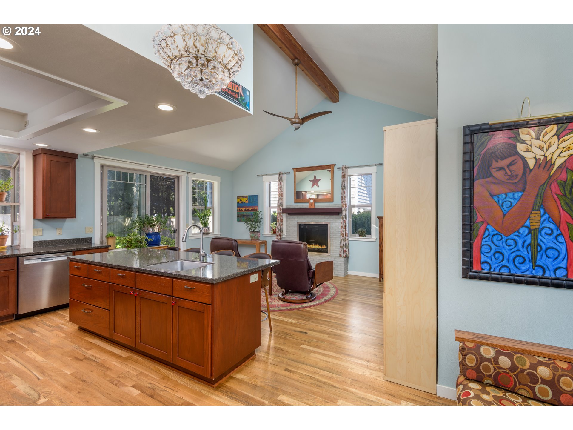 490 Lemwick Lane Yachats, OR 97498 - Photo 9 of 42 a living room with furniture a fireplace and a flat screen tv