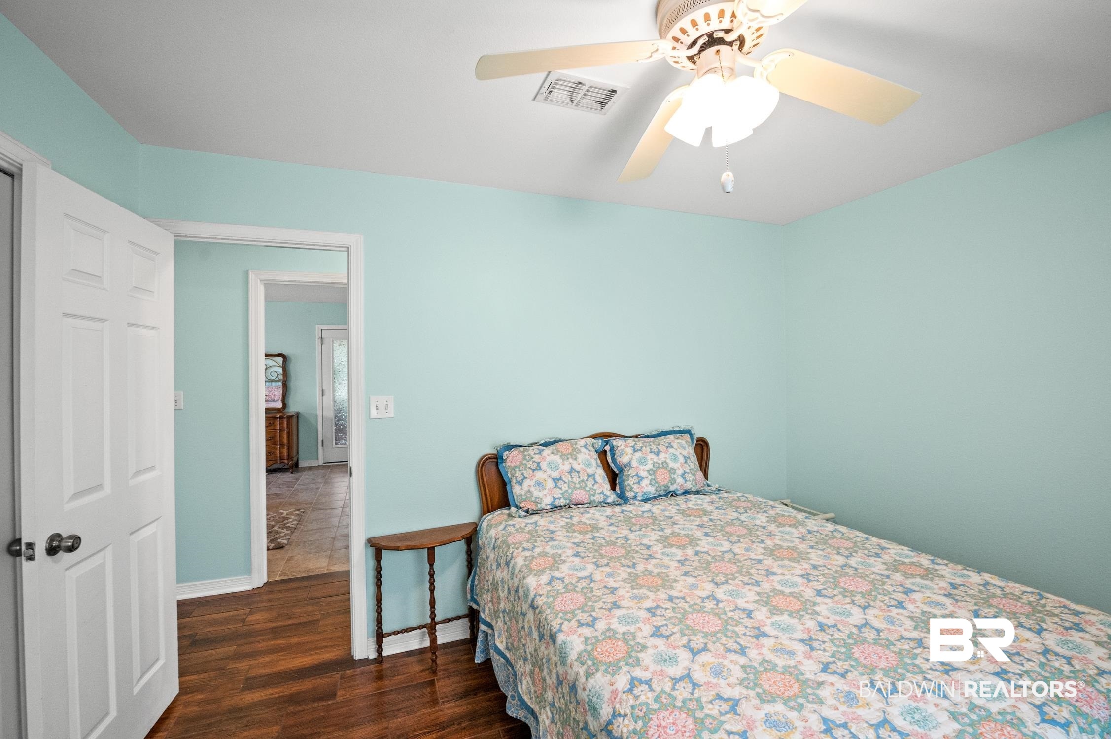 2553 Santa Rosa Drive Lillian, AL 36549 - Photo 30 of 51 Bedroom featuring dark wood-type flooring, visible vents, ceiling fan, and baseboards