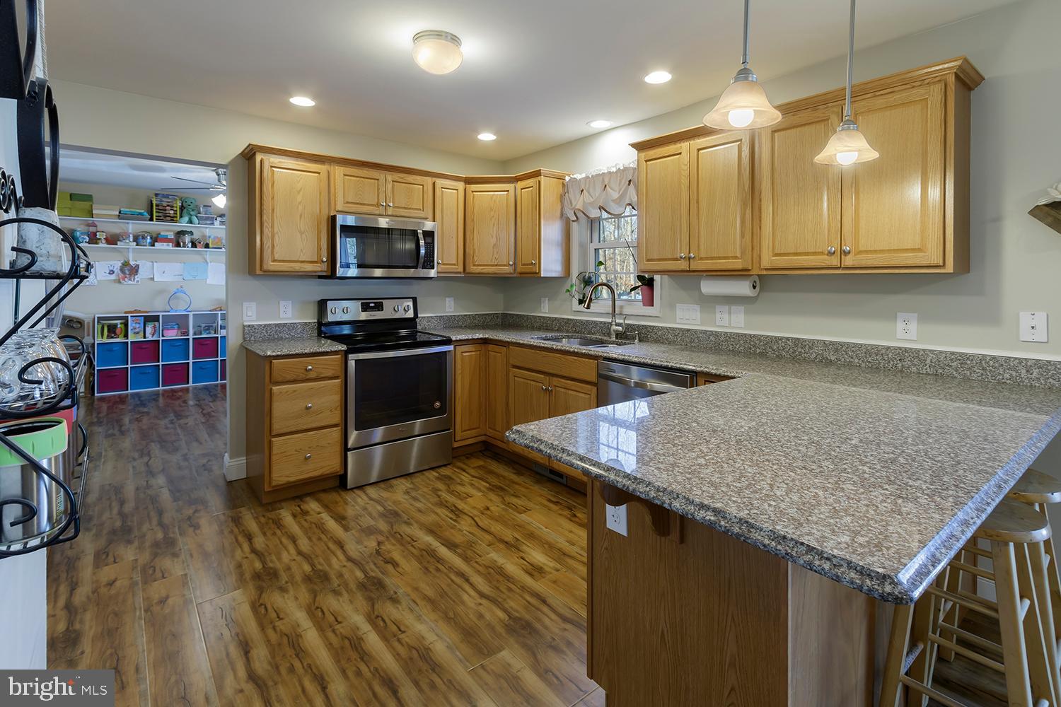 29 Avenue A Tabernacle, NJ 08088 - Photo 13 of 31 Kitchen with granite countertops and drop lights