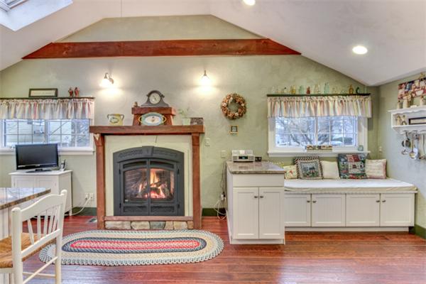 12 Sargent Road Winchester, MA 01890 - Photo 11 of 30 a living room with furniture and a fireplace