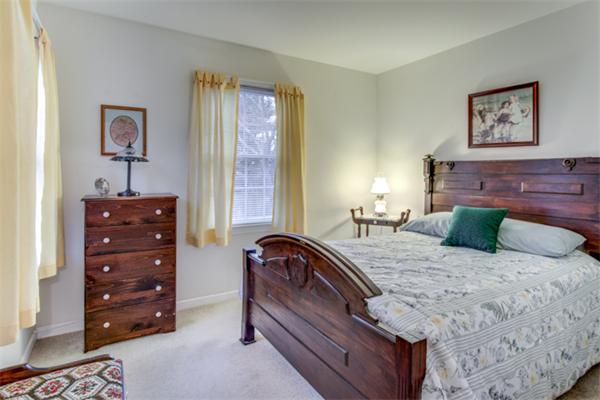 12 Sargent Road Winchester, MA 01890 - Photo 22 of 30 a bedroom with a bed and a dresser