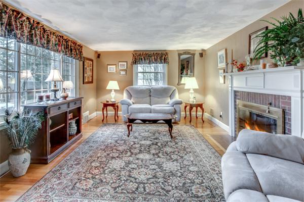 12 Sargent Road Winchester, MA 01890 - Photo 7 of 30 a living room with furniture and a fireplace