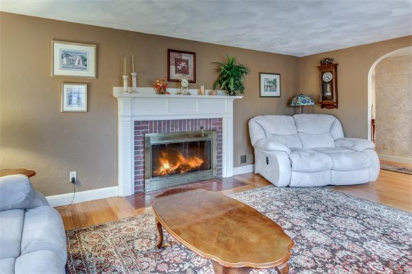 12 Sargent Road Winchester, MA 01890 - Photo 8 of 30 a living room with furniture and a fireplace