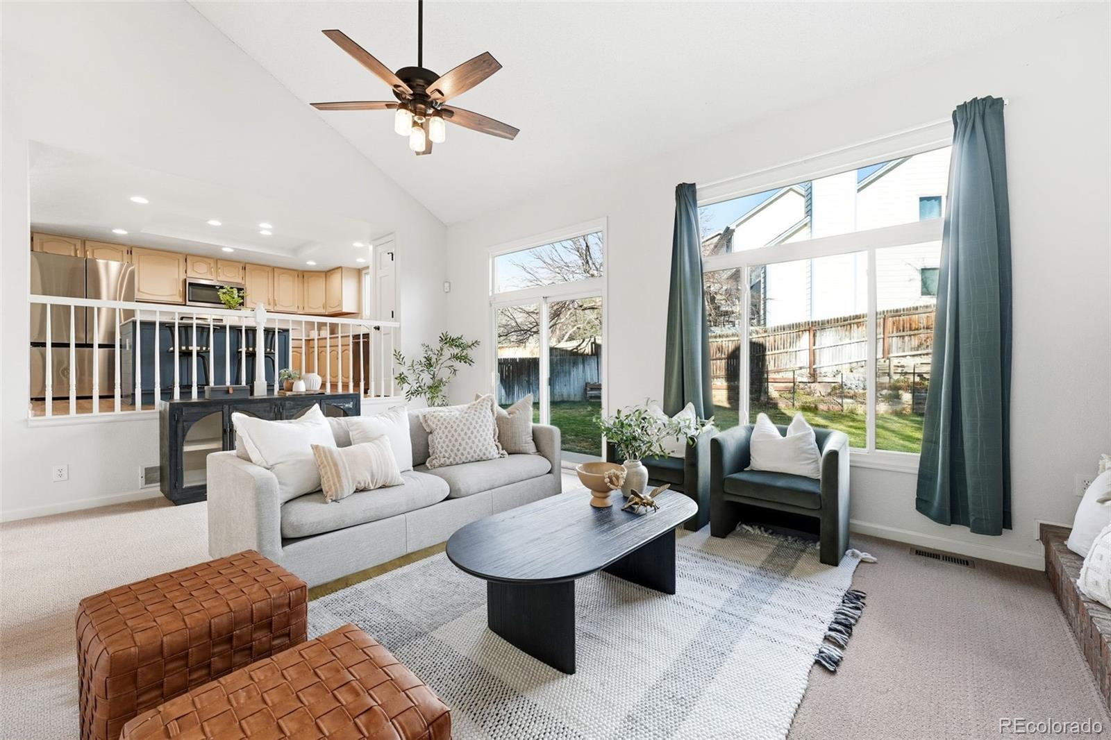 9426 Princeton Circle Highlands Ranch, CO 80130 - Photo 21 of 50 a living room with furniture and a large window