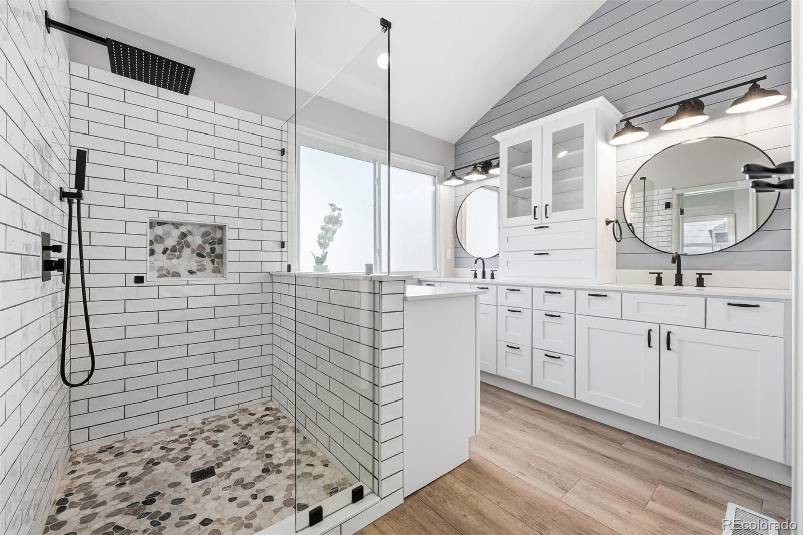 9426 Princeton Circle Highlands Ranch, CO 80130 - Photo 28 of 50 a bathroom with a sink a toilet and shower