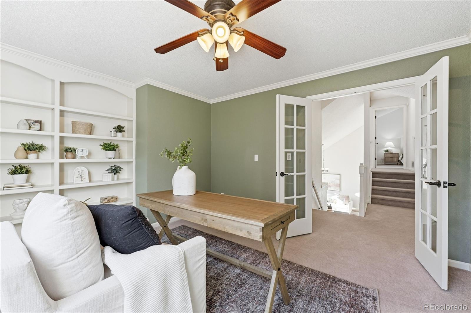 9426 Princeton Circle Highlands Ranch, CO 80130 - Photo 35 of 50 a living room with furniture