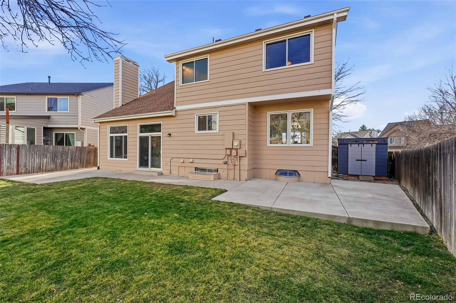 9426 Princeton Circle Highlands Ranch, CO 80130 - Photo 48 of 50 a view of a house with a patio