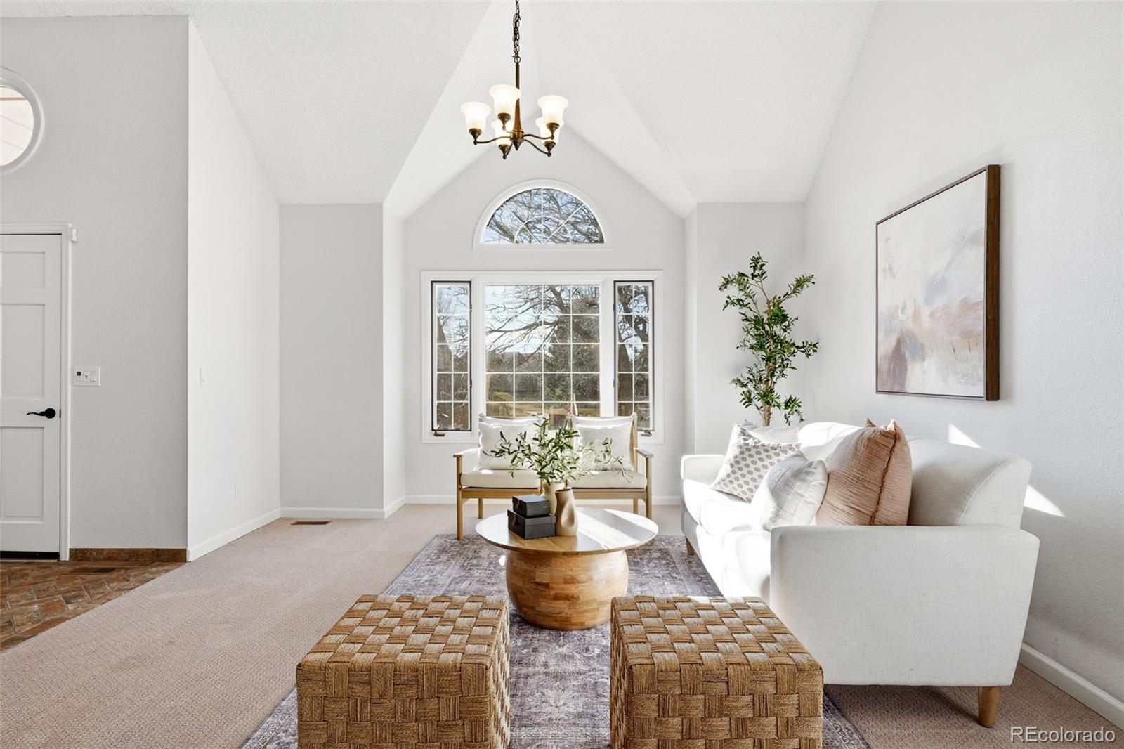 9426 Princeton Circle Highlands Ranch, CO 80130 - Photo 6 of 50 a living room with furniture and a large window