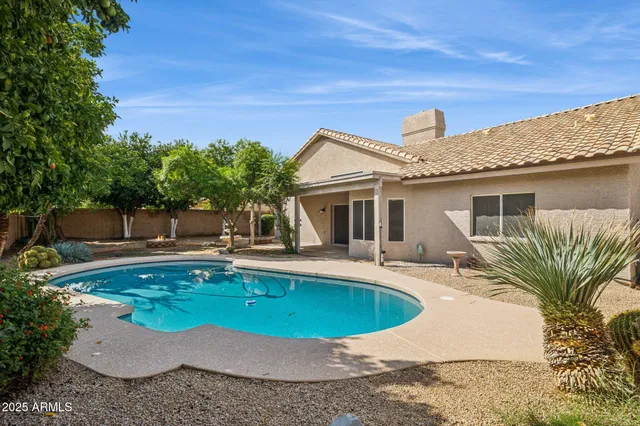 a view of a house with swimming pool
