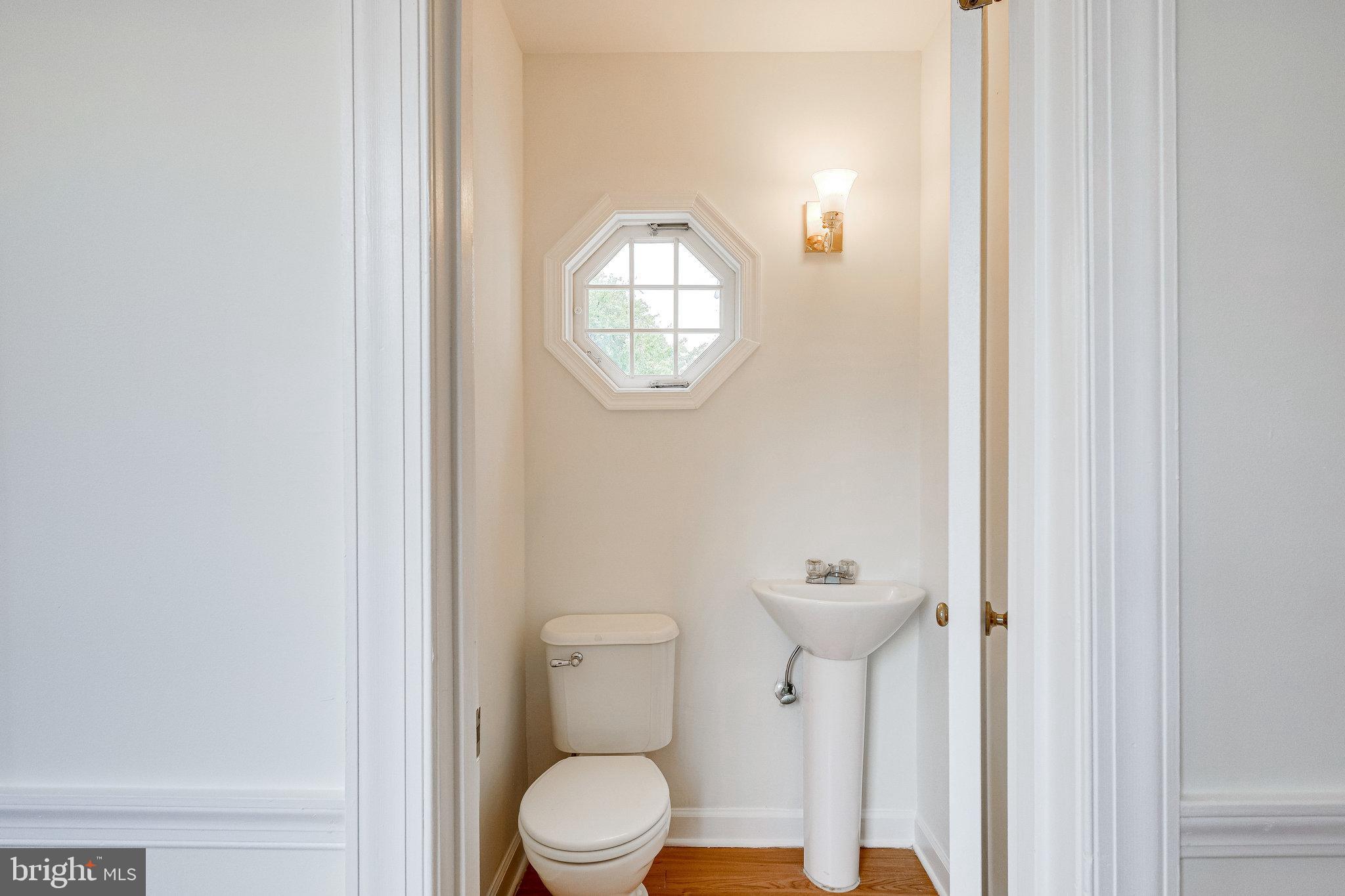 2431 33rd Street Southeast Washington, DC 20020 - Photo 18 of 36 Main level powder room