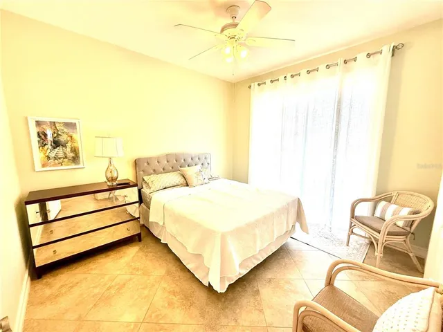 a bed room with a bed and a couch