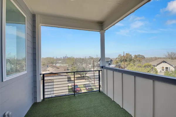 a view of a hallway with a window