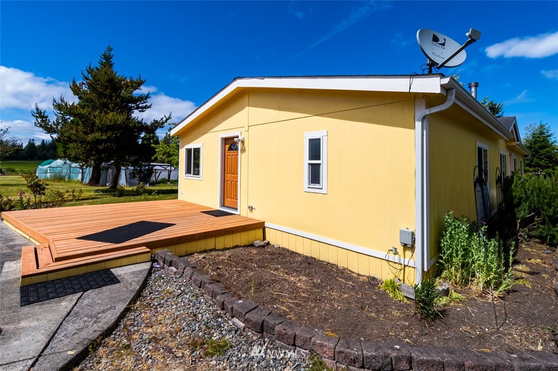 322 O Brien Road Port Angeles, WA 98362 - Photo 2 of 37 a view of a backyard with a patio