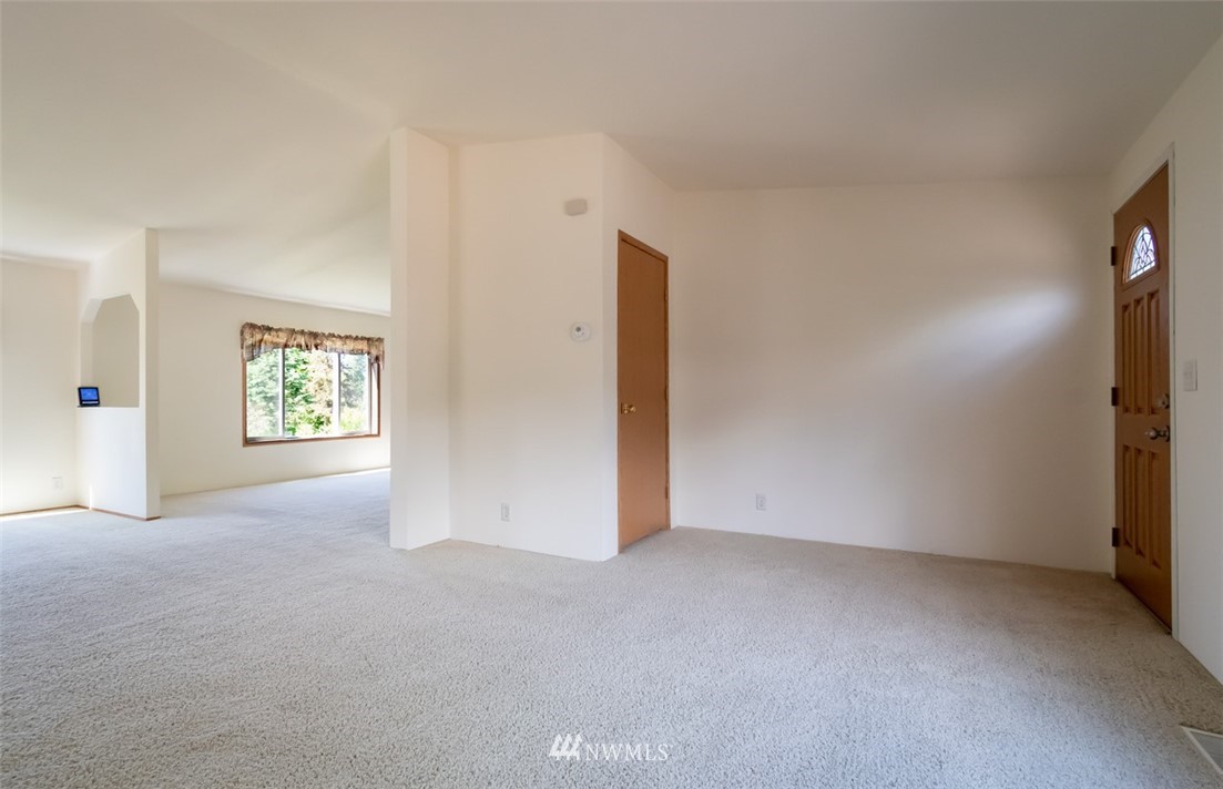 322 O Brien Road Port Angeles, WA 98362 - Photo 15 of 37 an empty room with windows