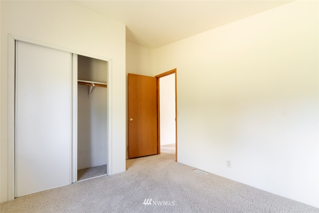 322 O Brien Road Port Angeles, WA 98362 - Photo 16 of 37 a view of an empty room with closet and a window