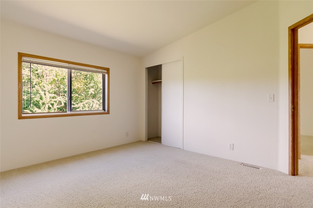322 O Brien Road Port Angeles, WA 98362 - Photo 19 of 37 an empty room with windows