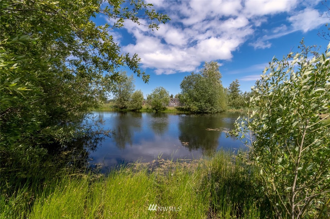322 O Brien Road Port Angeles, WA 98362 - Photo 3 of 37 a view of a lake from a yard