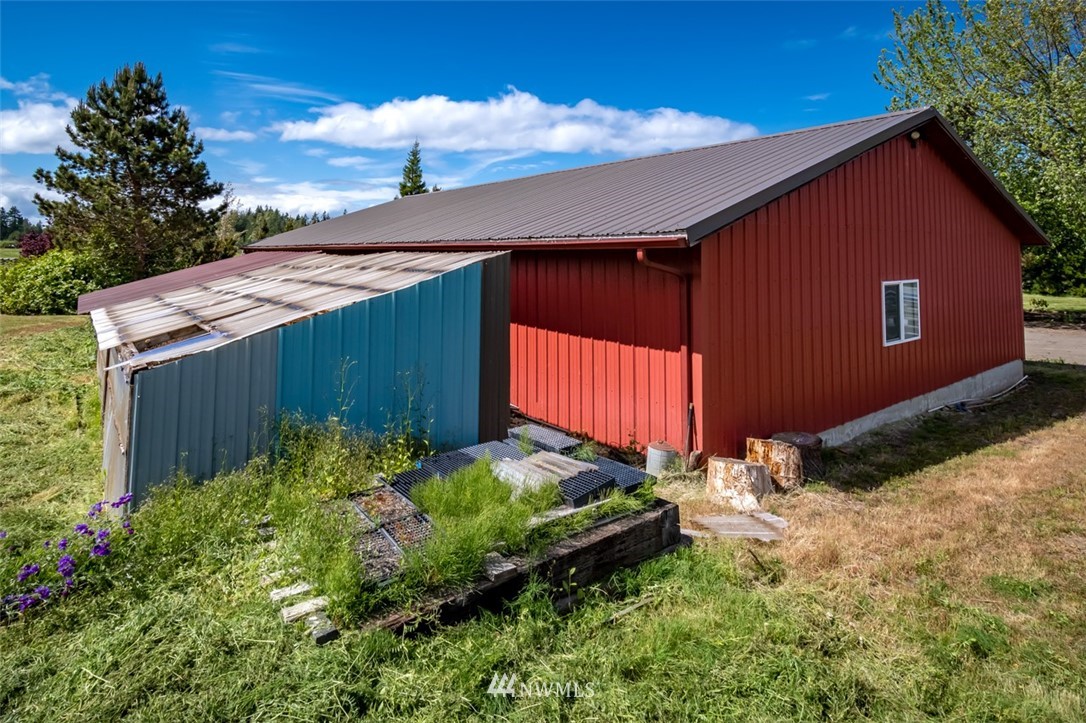 322 O Brien Road Port Angeles, WA 98362 - Photo 26 of 37 a backyard of a house with lots of green space