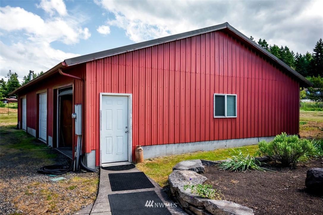 322 O Brien Road Port Angeles, WA 98362 - Photo 5 of 37 a view of a house with backyard